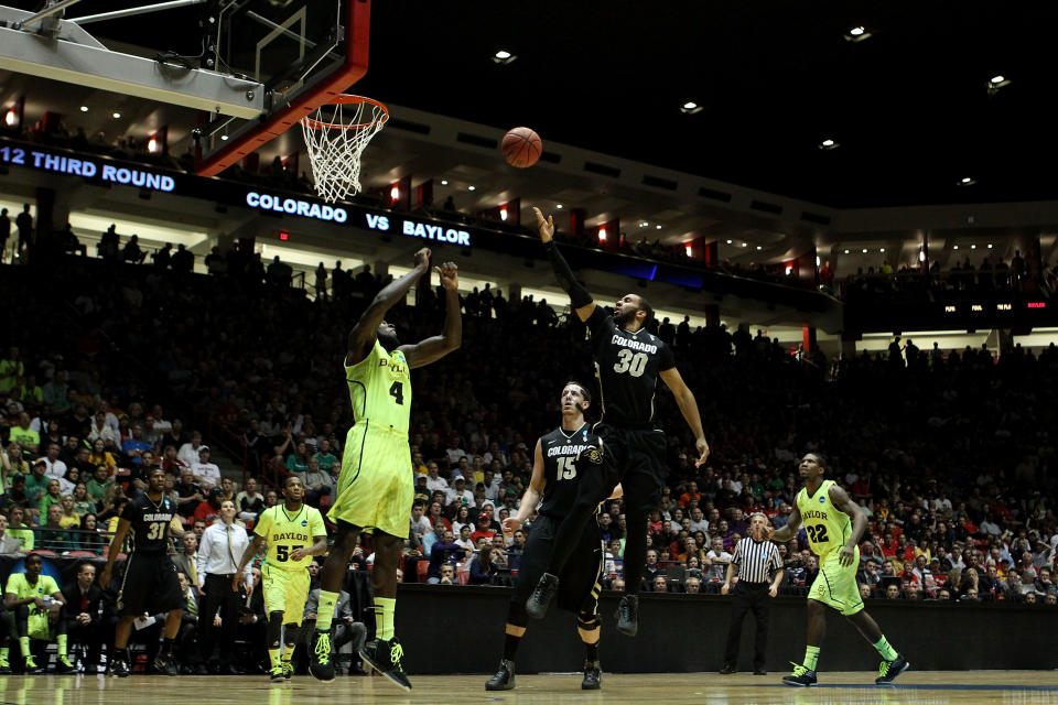 ALBUQUERQUE, NM - MARCH 17: Carlon Brown #30 of the Colorado Buffaloes shoots against Quincy Acy #4 of the Baylor Bears in the first half during the third round of the 2012 NCAA Men's Basketball Tournament at The Pit on March 17, 2012 in Albuquerque, New Mexico. (Photo by Christian Petersen/Getty Images)