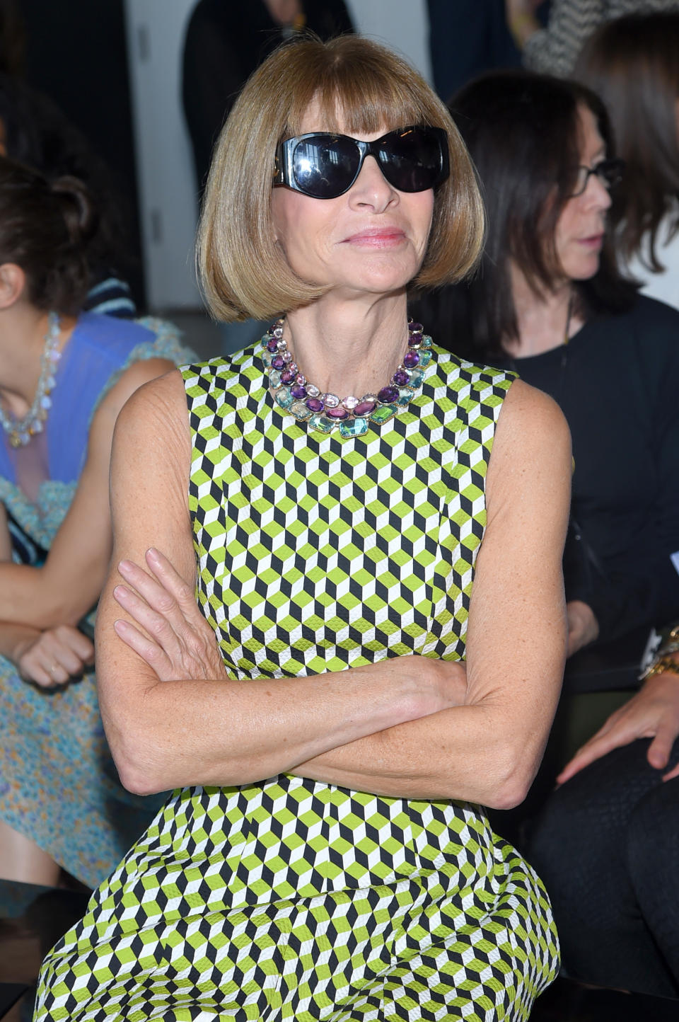 Anna Wintour famously always wears her sunglasses on the FROW [Photo: Getty]