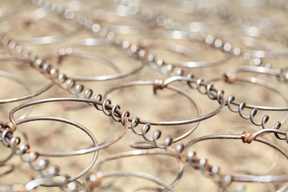 Close-up of mattress springs.