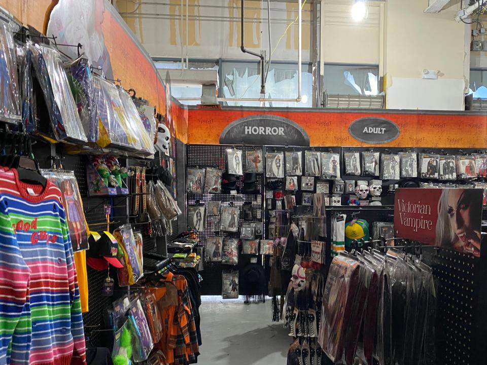 The "adult" section filled with costumes at a spirit halloween