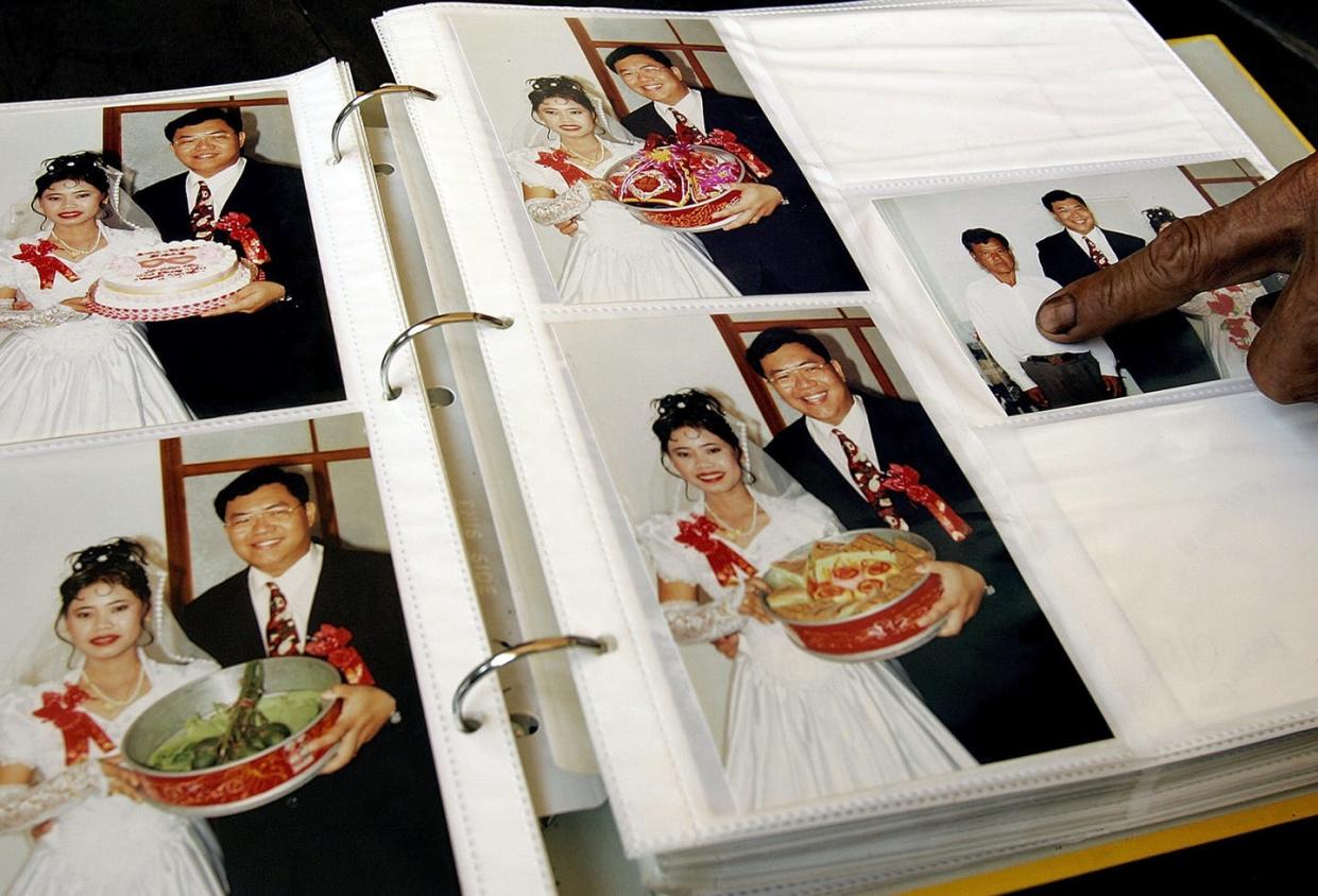 <span class="caption">A growing number of young Vietnamese women are marrying foreigners, mostly from China and South Korea. </span> <span class="attribution"><a class="link " href="http://www.apimages.com/metadata/Index/Vietnam-Brides-for-Sale/f078d0ba303d4673aa7a342a3ddabb59/15/0" rel="nofollow noopener" target="_blank" data-ylk="slk:AP Photo/Chitose Suzuki;elm:context_link;itc:0;sec:content-canvas">AP Photo/Chitose Suzuki</a></span>