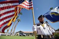 <p>USAF veteran David Carrasco pays tribute to Sen. John McCain, outside a mortuary in Phoenix, Ariz., Aug. 26, 2018. (Photo: Robyn Beck/AFP/Getty Images) </p>