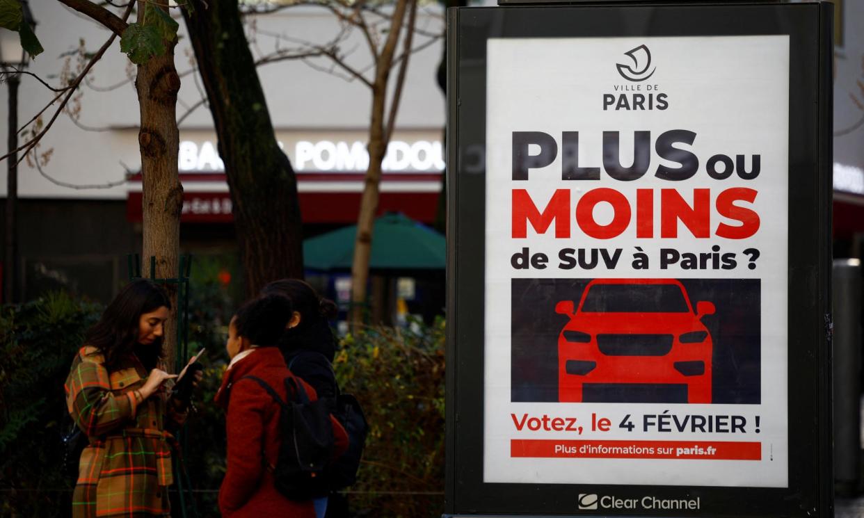 <span>A billboard on the SUV referendum in Paris.</span><span>Photograph: Sarah Meyssonnier/Reuters</span>