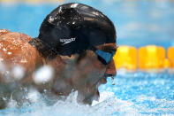 LONDON, ENGLAND - JULY 30: Michael Phelps of the United States reacts after he competed in the second semifinal heat of the Men's 200m Butterflyon Day 3 of the London 2012 Olympic Games at the Aquatics Centre on July 30, 2012 in London, England. (Photo by Clive Rose/Getty Images)