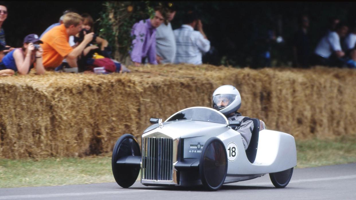 a person driving a race car