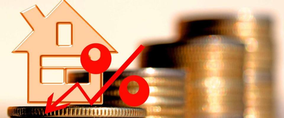 Red percent sign on a background of money . The concept of changing prices on the market