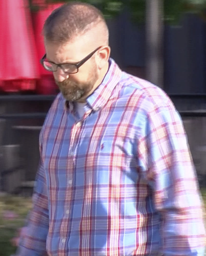 Jeffrey Middleton, a former sheriff's deputy in Rankin County, Miss., walks into the federal courthouse in Jackson, Miss., on Thursday, Aug. 3, 2023. Middleton and five other former law enforcement officers pleaded guilty Thursday to a racist assault on two Black men in a home raid that ended with an officer shooting one man in the mouth. (Jerome DeLoach/WLBT via AP)