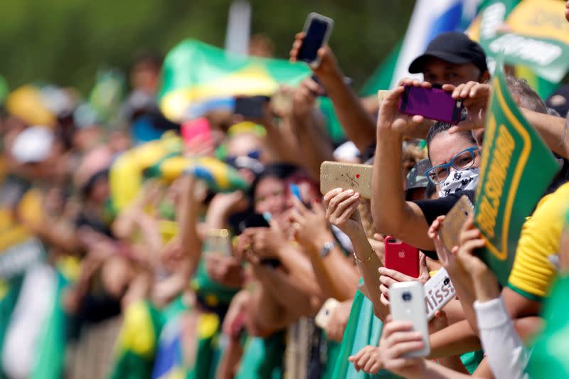 Demonstrators take part in a protest in favor of Brazillian President Jair Bolsonaro in front of the Planalto Palace, amid the coronavirus disease (COVID-19) outbreak, in Brasilia