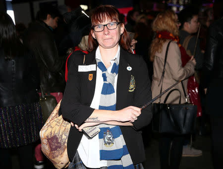 People gather for a global fan event to preview the film "Fantastic Beasts and Where to Find Them" at Cineworld IMAX at Leicester Square in London, Britain October 13, 2016. REUTERS/Neil Hall