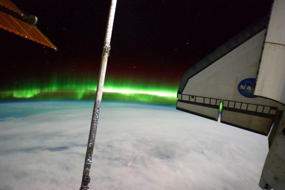 In this handout image provided by the National Aeronautics and Space Administration (NASA), the Southern Lights or Aurora Australis and the port side wing of NASA space shuttle Atlantis can be seen from the International Space Station July 14, 2011 in space. Space shuttle Atlantis is on the last leg of a 12-day mission to the International Space Station where it delivered the Raffaello multi-purpose logistics module packed with supplies and spare parts. This was the final mission of the space shuttle program, which began on April 12, 1981 with the launch of Colombia. (Photo by NASA via Getty Images)