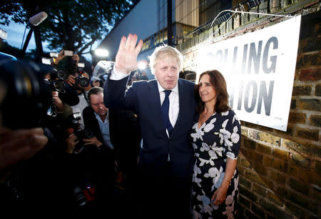 FILE PHOTO: Former London Mayor Boris Johnson and his wife Marina Wheeler arrive to vote in the EU referendum, at a polling station in north London, Britain June 23, 2016. REUTERS/Peter Nicholls/File Photo
