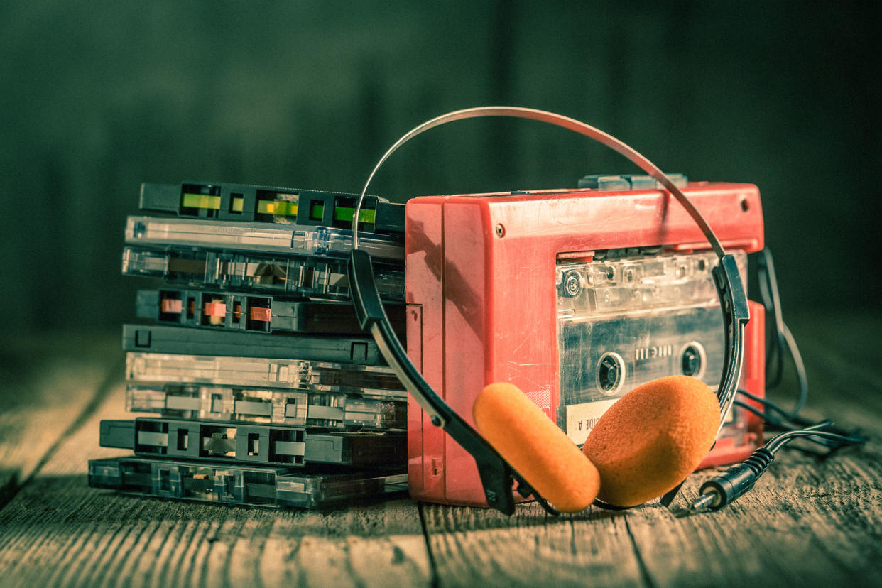Retro cassette tape with walkman and headphones.