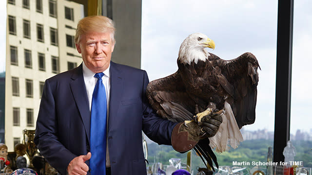 Donald Trump is on the cover of <em>Time</em> magazine, and the headline reads: "Deal with it." The meme-worthy photo shoot features the Republican presidential hopeful posing with a 27-year-old American bald eagle -- the emblem of the United States. Check out this candid moment when the eagle gets a little energetic on set! Time Inc. Magazine Company <strong>WATCH: Josh Groban Hilariously Sings Donald Trump's Tweets</strong> Of course, the new issue is not all fun and games. Trump doesn't hold back when it comes to how he really feels about his political opponents. "They’re puppets," he tells the magazine. "I’m the only non-puppet in the group." Time Inc. Magazine Company The former <em>Celebrity Apprentice</em> star went on to answer questions regarding how his daughters, Ivanka and Tiffany Trump, feel about his presidential aspirations. <strong> WATCH: Can Donald Trump Pull Off a Presidential Campaign? An Inside Look at His Strategy </strong> "Ivanka was interesting because I'm very strong on women’s health issues," Trump says about a triumphant moment she shared with his daughter. "And I couldn't believe what [Jeb] Bush said last week about he wouldn’t fund, essentially wouldn’t fund women’s health issues. And I hit him hard. And she came back and she said, 'I’m so glad you did that Dad, because people don’t know how you respect women, they don’t know how you get it, and you have to get that word out.'" <strong>MORE: Donald Trump -- Rosie O'Donnell 'Actually Saved Me'</strong> Time Inc. Magazine Company Not long after announcing his presidential run, Trump sat down with ET to defend his controversial remarks made about Mexican immigrants. <strong> MORE: 7 of the Most Ridiculous Things Donald Trump Said During the GOP Debate </strong> "I don't have a racist bone in my body," Trump said, defending himself against accusations of racism. "The fact that I want a strong border and the fact that I don't want illegal immigrants pouring into this country, that doesn't make me a racist, it means I love this country and I want to save this country."