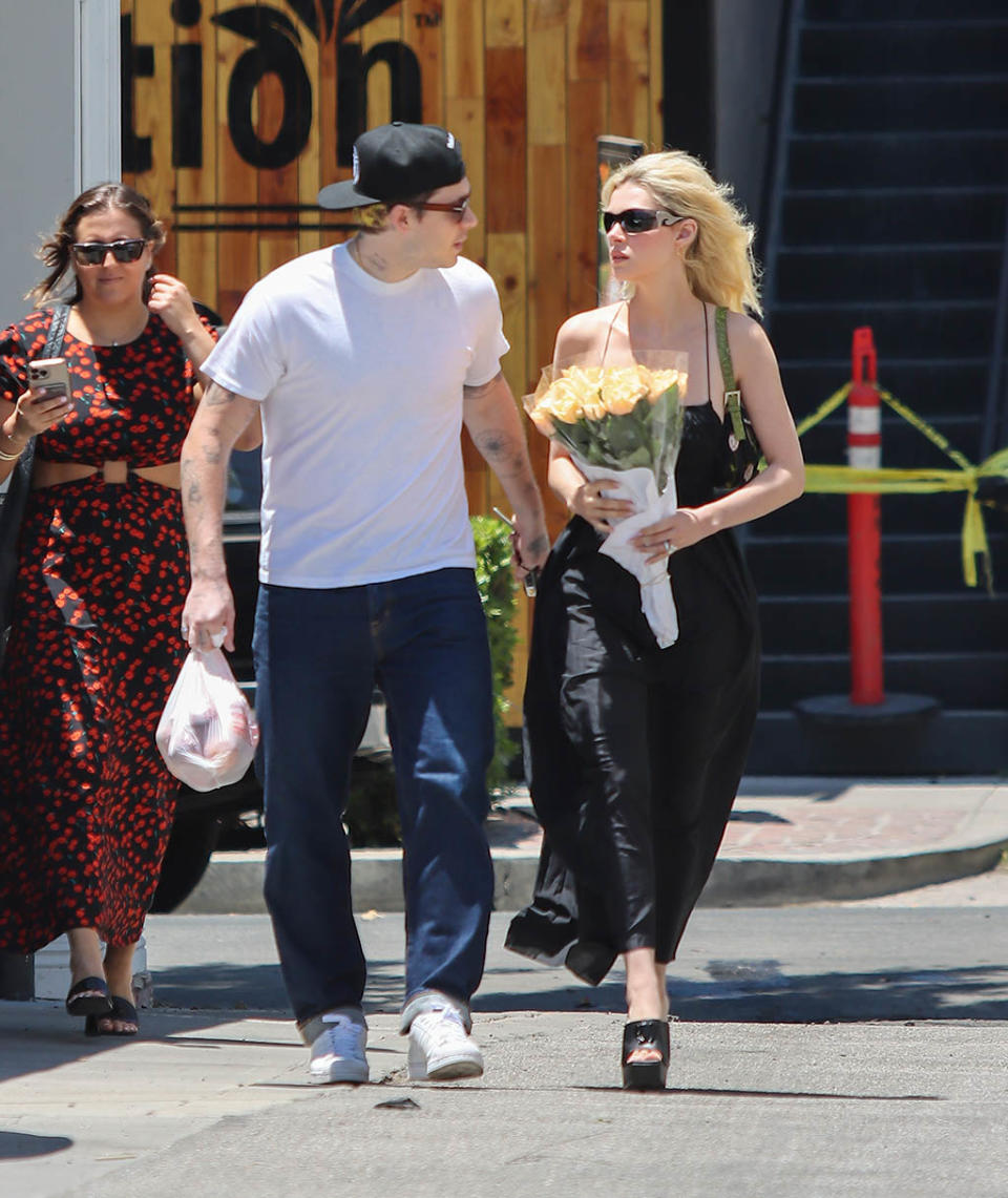 (L-R) Brooklyn Beckham and Nicola Peltz out in Los Angeles on May 29, 2022. - Credit: BG020/Bauergriffin.com / MEGA
