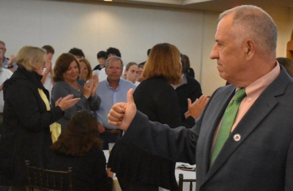 Bristol County District Attorney Thomas M. Quinn III gives supporters the thumbs-up at his campaign party at Whites of Westport on Tuesday, Sept. 6.