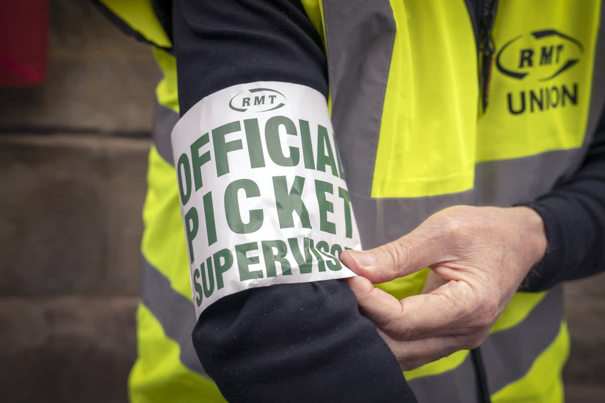 A picket line outside Edinburgh’s Waverley Station (Jane Barlow/PA) (PA Wire)