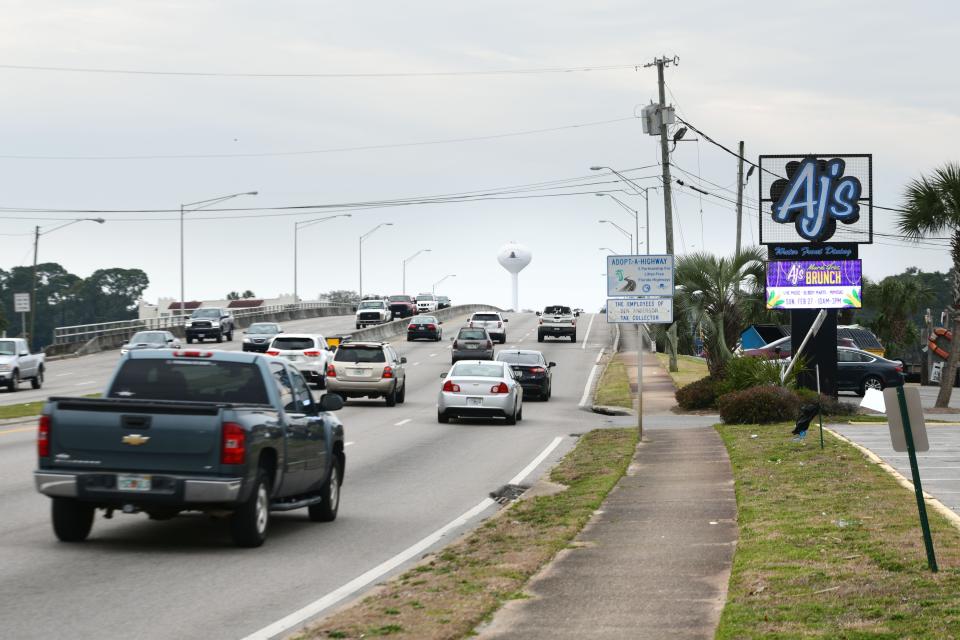 Traffic moves along the Cinco Bayou Bridge, where a 15-year-old boy riding in a car was shot in the head about 4:55 p.m. Thursday. The victim was being treated for his injury and the Fort Walton Beach Police Department is seeking information on the case.