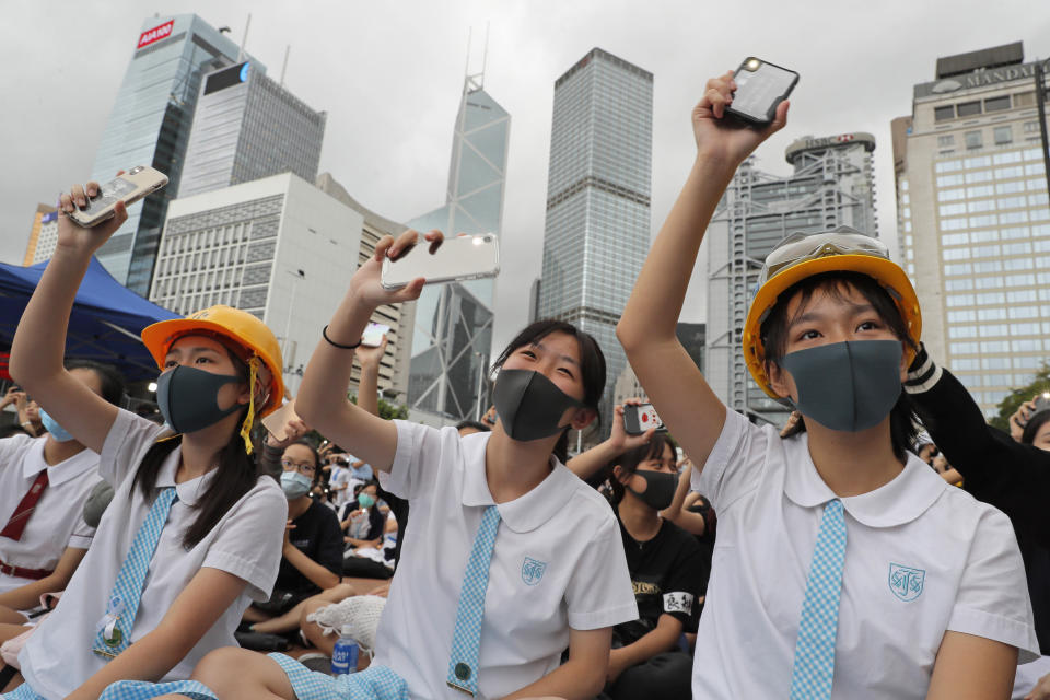 Students wear protective gear during a protest in Hong Kong, Monday, Sept. 2, 2019. Hong Kong has been the scene of tense anti-government protests for nearly three months. The demonstrations began in response to a proposed extradition law and have expanded to include other grievances and demands for democracy in the semiautonomous Chinese territory. (AP Photo/Kin Cheung)