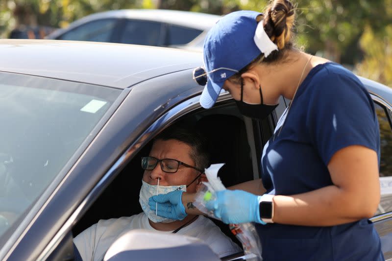 Alex Vazquez, 42, is given a PCR coronavirus test, as the global outbreak of the coronavirus disease (COVID-19) continues, in Malibu