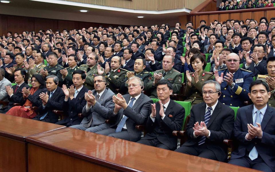 A national meeting at the People's Palace of Culture in Pyongyang on Monday in celebration of the 85th founding anniversary of the Korean People's Army - Credit: Reuters