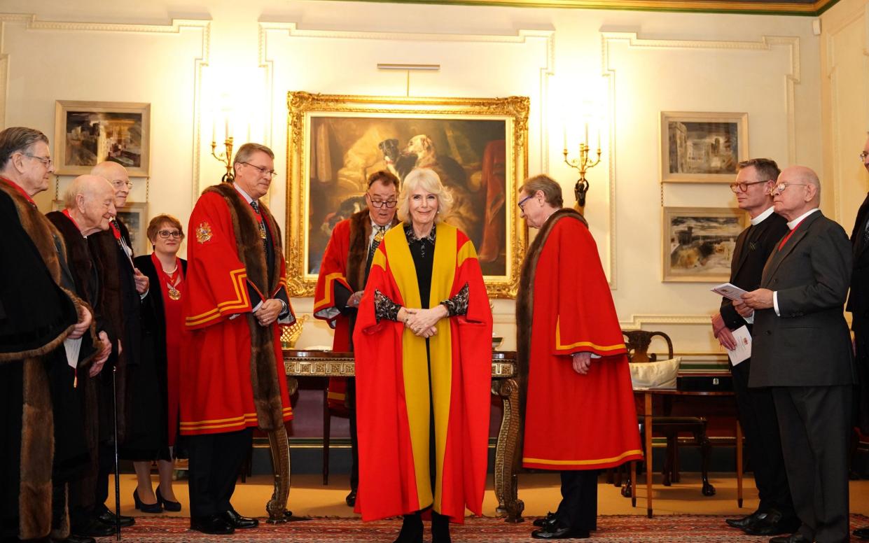 Queen Camilla is installed as an Honorary Liveryman of the Worshipful Company of Fan Makers during a ceremony at Clarence House, central London