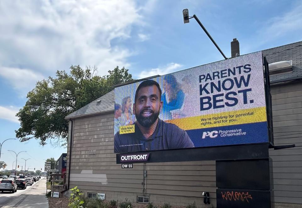 A billboard along Donald Street in Winnipeg makes PC Fort Whyte candidate Obby Khan the face of the party's parental rights platform.