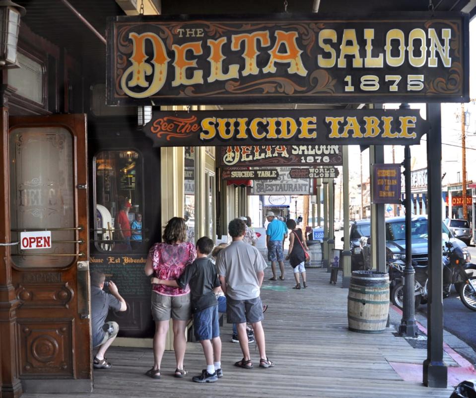 <div class="inline-image__caption"><p>Tourists enjoy the attractions in Virginia City, Nevada, a gold and silver boomtown in the 1860s and 1870s.</p></div> <div class="inline-image__credit">Robert Alexander/Getty</div>