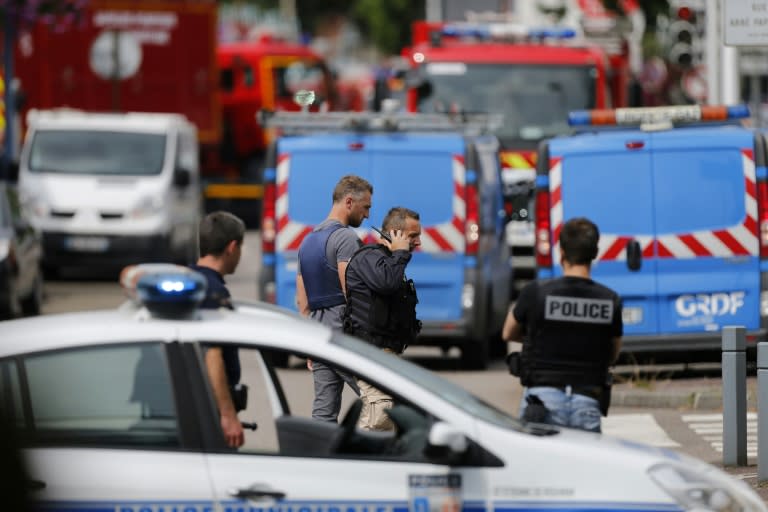 Emergency services arrive at the scene of a hostage-taking at a church in Saint-Etienne-du-Rouvray, near Rouen in northern France, on July 26, 2016