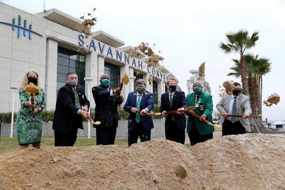 Governor Brian Kemp (third from right) joins local dignitaries including Savannah Mayor Van Johnson (third from left) and Chatham County Commission Chairman Chester Ellis (second from right) Wednesday during a ceremonial ground breaking for the expansion of the Savannah Convention Center.