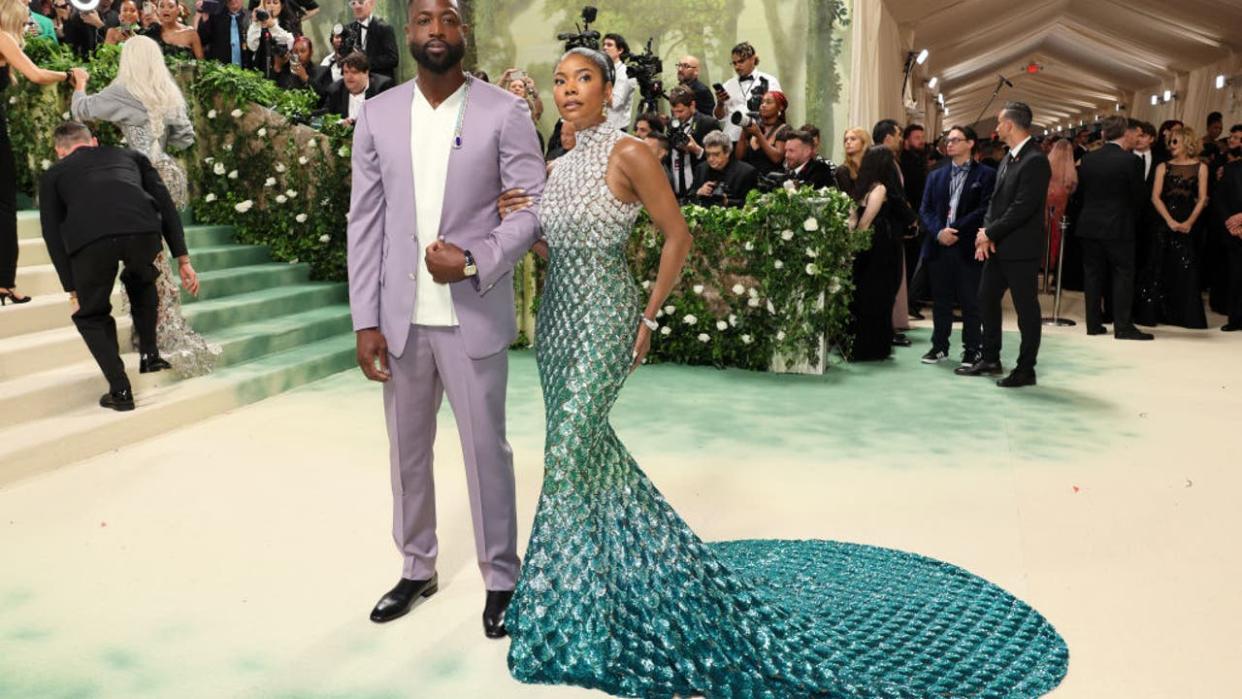 <div>NEW YORK, NEW YORK - MAY 06: (L-R) Dwyane Wade and Gabrielle Union attend The 2024 Met Gala Celebrating "Sleeping Beauties: Reawakening Fashion" at The Metropolitan Museum of Art on May 06, 2024 in New York City. (Photo by Dia Dipasupil/Getty Images)</div>