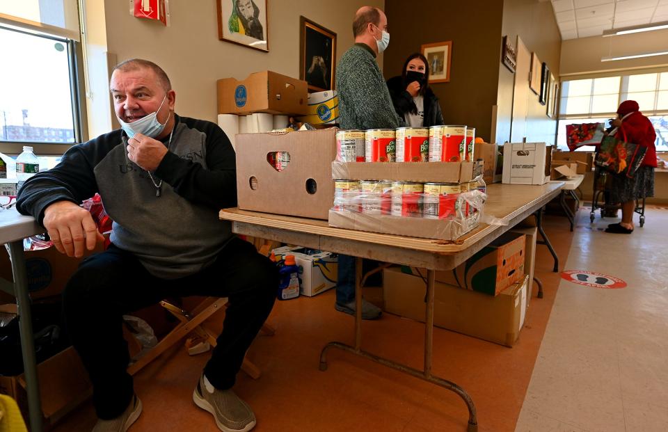 Billy Riley, manager of St. John's Food for the Poor Program, can often be found in his chair greeting partrons as they arrive.