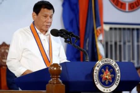 Philippines President Rodrigo Duterte speaks during the ceremony marking the anniversary of the Philippines Coast Guard in Manila, Philippines, October 12, 2016. REUTERS/Damir Sagolj