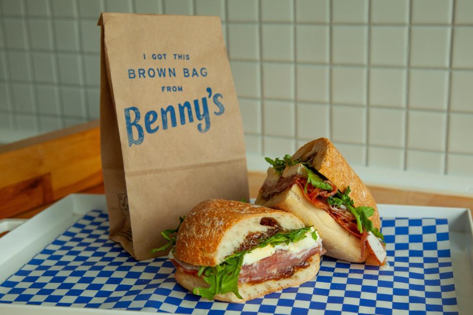 The "Prosciutto Paisan" sandwich from Benny's Brown Bag in Peekskill: Imported prosciutto di parma, spicy soppressata, fresh mozzarella, fig jam, arugula on a Ciabatta long roll.