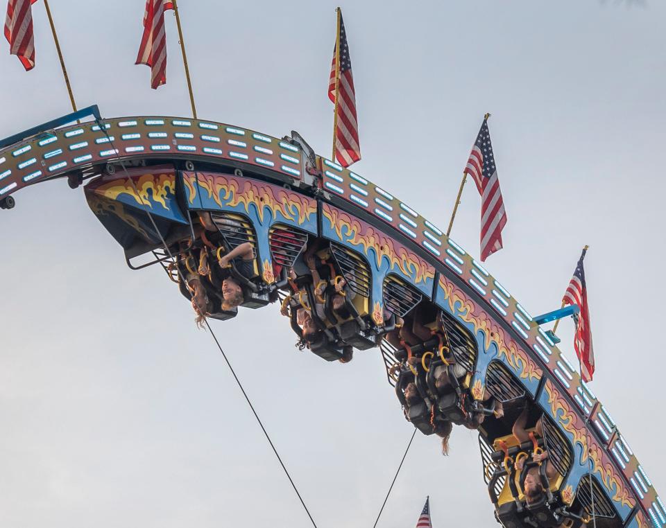 Riders take a turn on the Ring Of Fire during last year's Ocean County Fair.