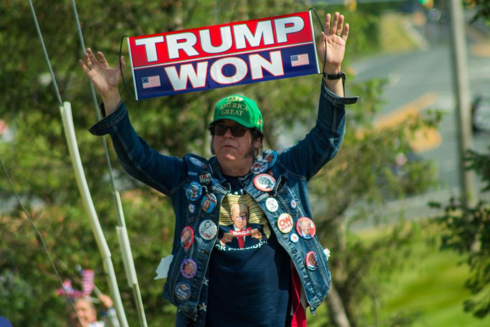 Edward X. Young was one of the protesters gathered outside of Clarence Dillion Public Library in Bedminster, N.J to oppose the indictment of former president Donald Trump.