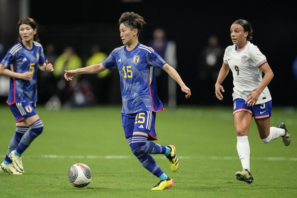 Japan's Aoba Fujino (15) moves the ball against the United States in the first half of the SheBelieves Cup women’s soccer tournament, Saturday, April 6, 2024, in Atlanta. (AP Photo/Mike Stewart)