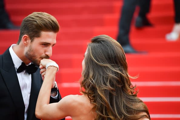 Brazilian model Izabel Goulart and German goalkeeper Kevin Trapp arrive on May 22, 2017 for the screening of the film 'The Killing of a Sacred Deer' at the 70th edition of the Cannes Film Festival in Cannes, southern France