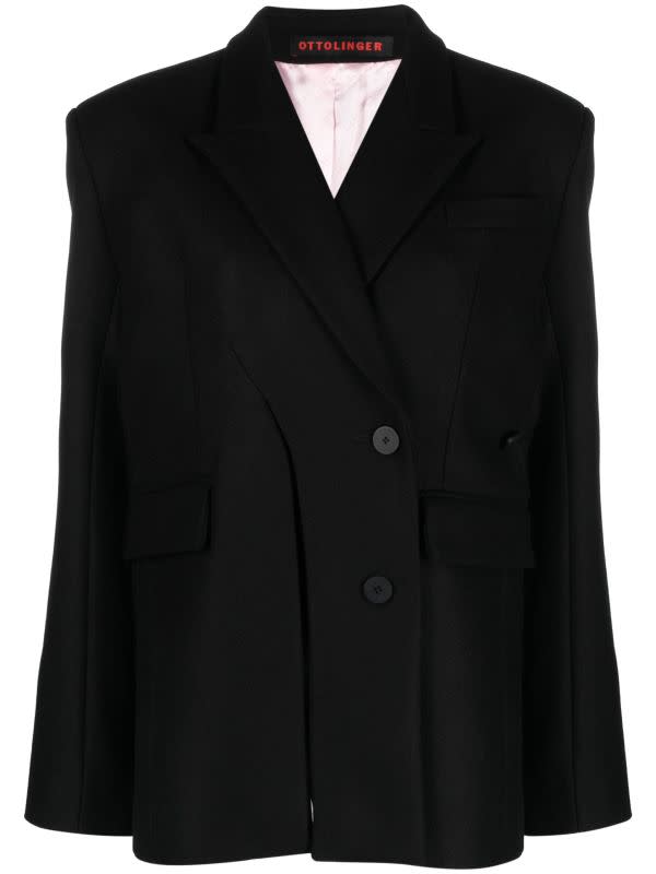 <p>Ottolinger Black Split Blazer, <s>$900</s> $477, <a href="https://go.skimresources.com?id=133023X1595699&xs=1&url=https%3A%2F%2Fwww.ssense.com%2Fen-us%2Fwomen%2Fproduct%2Fottolinger%2Fblack-split-blazer%2F14347031%3Fgad_source%3D1%26gclid%3DCj0KCQjw8pKxBhD_ARIsAPrG45lCXvhcXhJdKnVCg9C8PN3voelt9rZt8vJSzLvEtGlb5wxNS82QHU0aAqgzEALw_wcB" rel="noopener" target="_blank" data-ylk="slk:available here;elm:context_link;itc:0;sec:content-canvas" class="link ">available here</a> (sizes XXXS-L)</p>