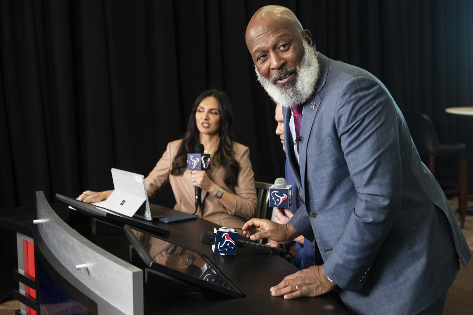 New Houston Texans NFL football team head coach Lovie Smith gets up from an interview with Texans TV after an introductory press conference, Tuesday, Feb. 8, 2022, at NRG Stadium in Houston. (Brett Coomer/Houston Chronicle via AP)