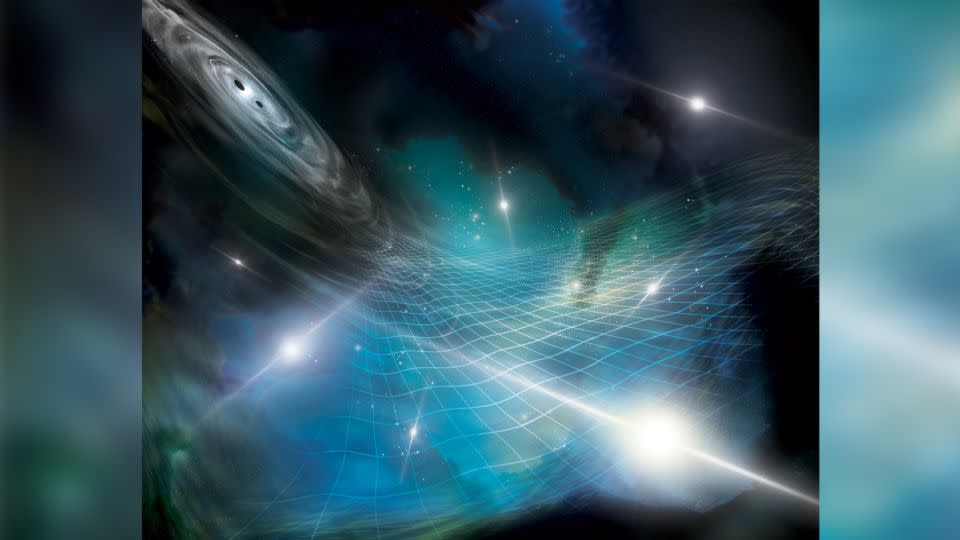 An artist's illustration depicts pulsars being affected by gravitational ripples produced by a supermassive black hole merger in a distant galaxy. - Aurore Simonnet for the NANOGrav Collaboration