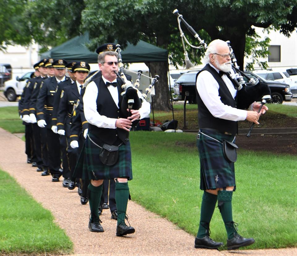 Bag pipes are played in procession at the start of the Wichita Falls Police Department Memorial Ceremony on Monday, May 15, 2023.