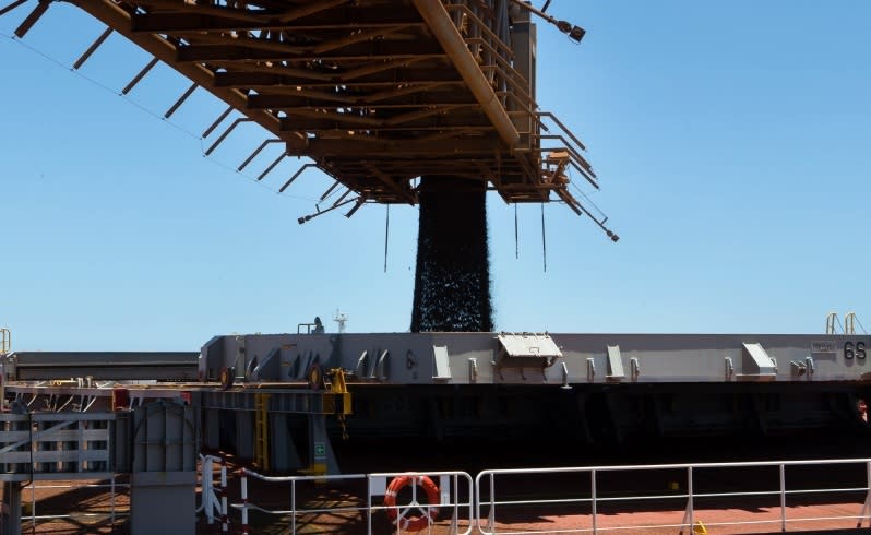 Iron ore from Fortescue Metals Group is loaded onto a ship at Port Hedland's Herb Elliot Port. Picture: Mogens Johansen/The West Australian.