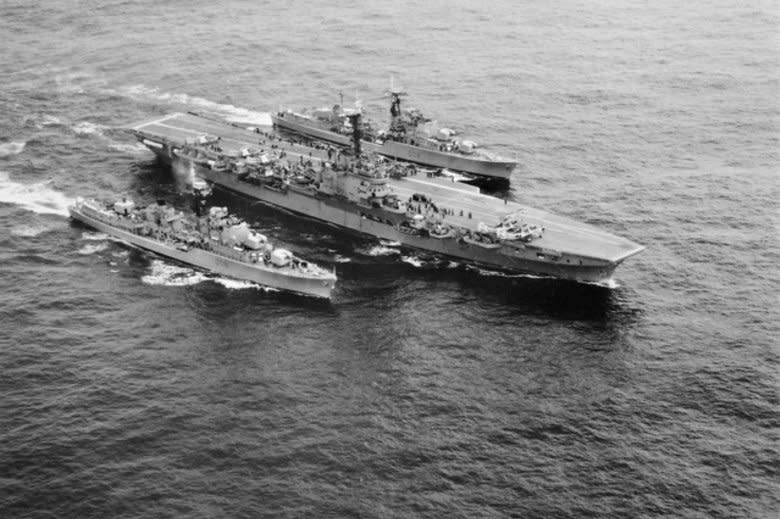 Aerial starboard side view of the Royal Australian Navy aircraft carrier HMAS Melbourne (R21) and the destroyers HMAS Vendetta (D08) and HMAS Voyager (D04) underway, circa in 1959. On February 10, 1964, 82 Australian sailors died when the Melbourne and the Voyager collided off New South Wales, Australia. File Photo courtesy of the Australian armed forces