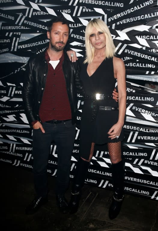 Former Versus Versace creative director Anthony Vaccarello and designer Donatella Versace in London