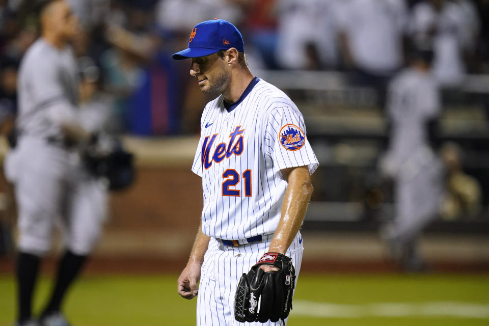 New York Mets starting pitcher Max Scherzer (21) walks toward the dugout after striking out New York Yankees' Aaron Judge during the seventh inning of a baseball game Wednesday, July 27, 2022, in New York. (AP Photo/Frank Franklin II)