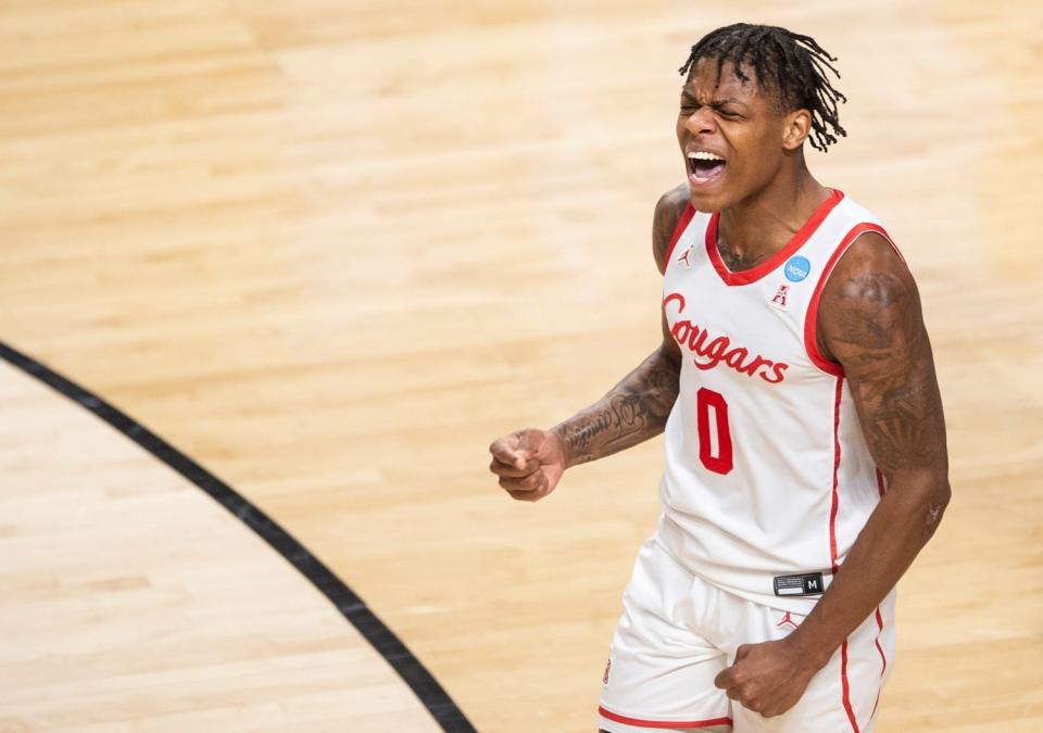 Houston Cougars guard Marcus Sasser (0) celebrates a score as Auburn Tigers take on Houston Cougars in the second round of NCAA Tournament at Legacy Arena in Birmingham, Ala., on Saturday, March 18, 2023.