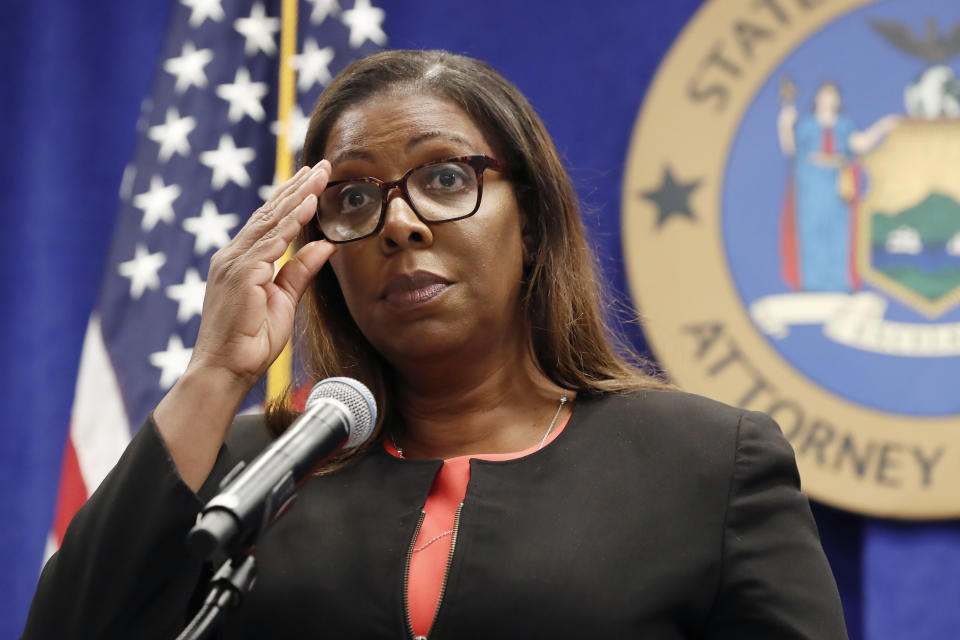 FILE — In this Aug. 6, 2020, file photo, New York State Attorney General Letitia James adjusts her glasses as she announces that the state is suing the National Rifle Association during a press conference, in New York. A New York judge on Thursday, Jan. 21, 2021, denied the National Rifle Association's bid to throw out a state lawsuit that seeks to put the powerful gun advocacy group out of business. (AP Photo/Kathy Willens, File)