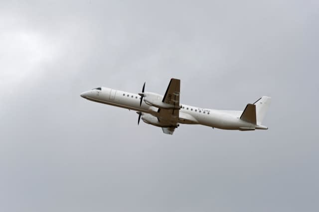 A Loganair Saab 2000 flying for Flybe G-LGNR leaves Aberdeen for East Midlands Airport.  SCO 9376.