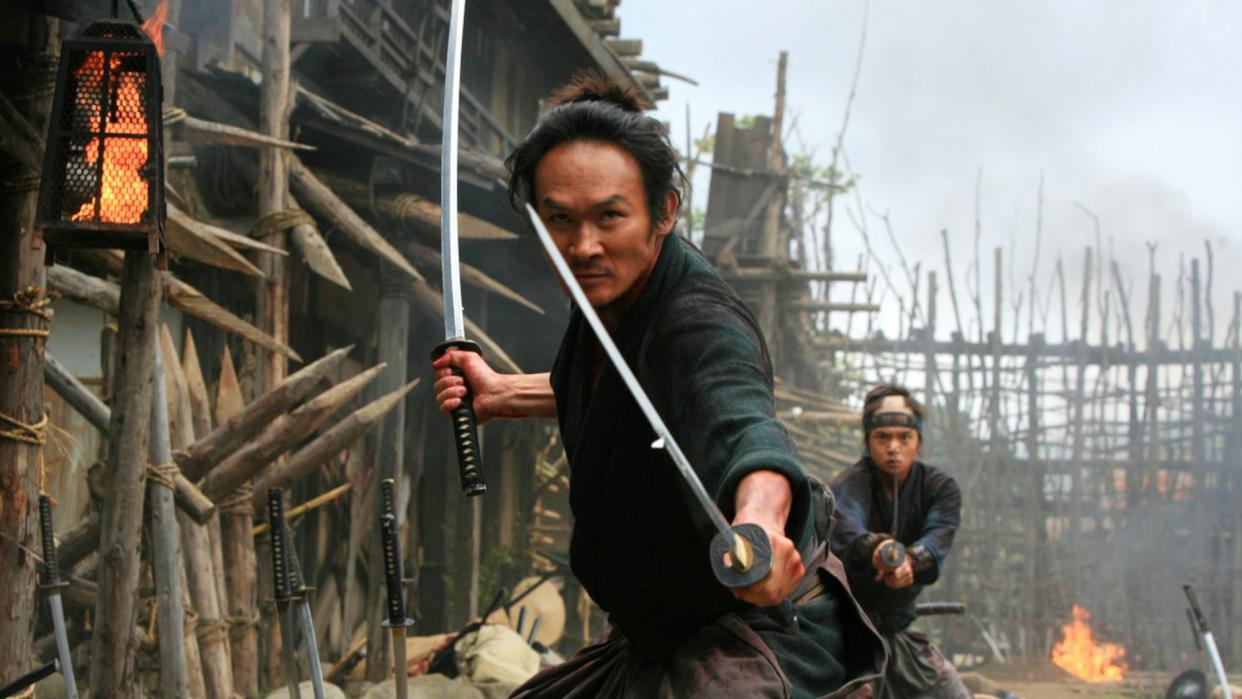  A samurai wields two swords in 13 Assassins. 