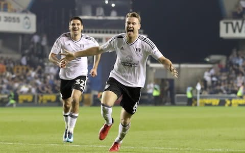 McDonald curled home a superb second to put Fulham firmly in control - Credit: PA